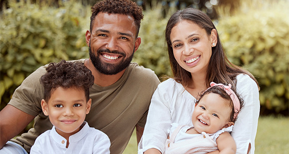 happy family enjoying time together outdoors featuring two children and two parents showcasing joyful moments 10 fun family activities