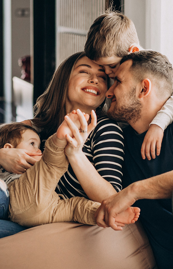 happy family of four enjoying time together with smiles and laughter creating joyful moments 6 special connections in family life