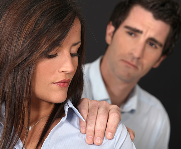 man and woman in emotional conversation showing relationship tension expressing feelings of concern and sadness five signs of a troubled relationship